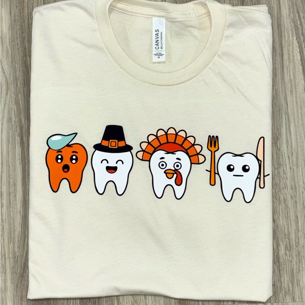 Medium Bella Canvas Cream Graphic Tee for dentists and dental hygienists